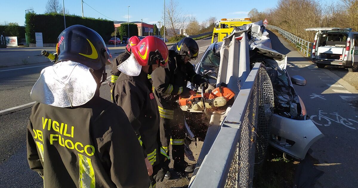 Car Crashes into a Guardrail